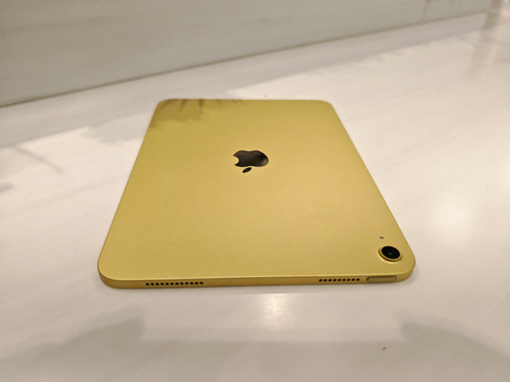 iPad A16 power button, speaker grilles.