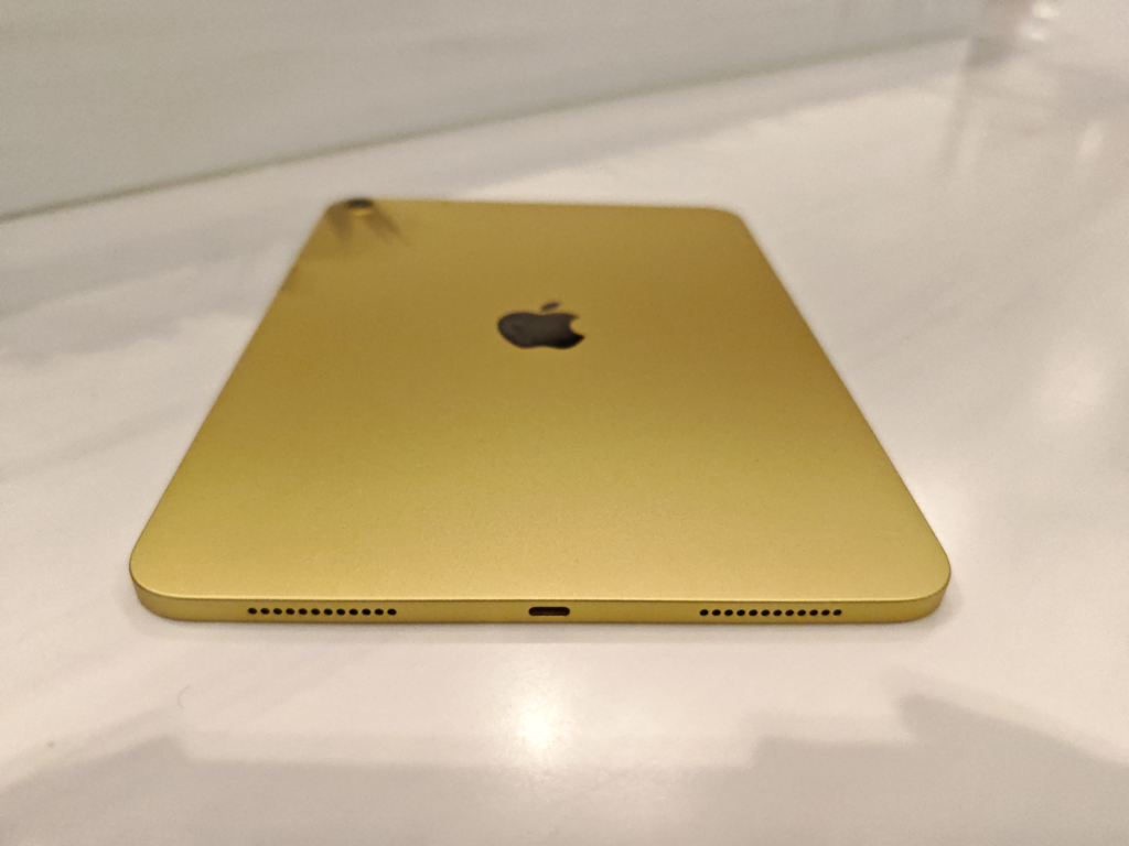 iPad A16 USB-C port, speaker grilles.