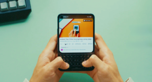 Titan 2 in hand, showing off the tactile keyboard.