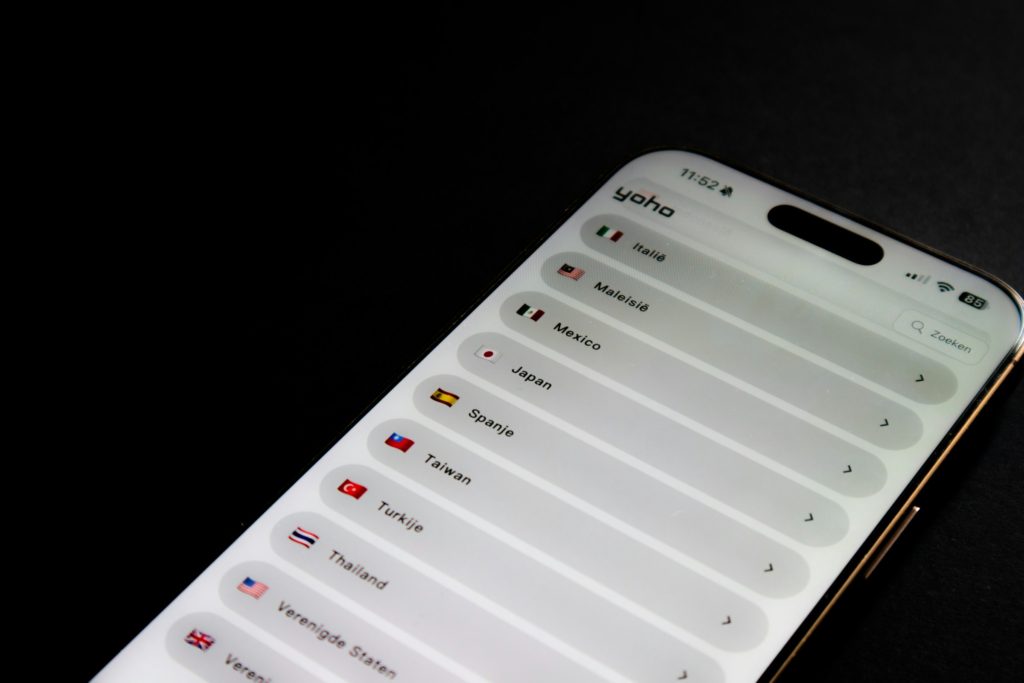Global version phones explained: A modern smartphone showing various destinations, each represented with their respective flags.