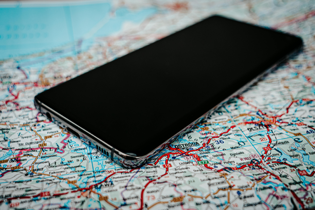 Global version phones explained: A Close-Up Shot of a Smartphone on the globe map.