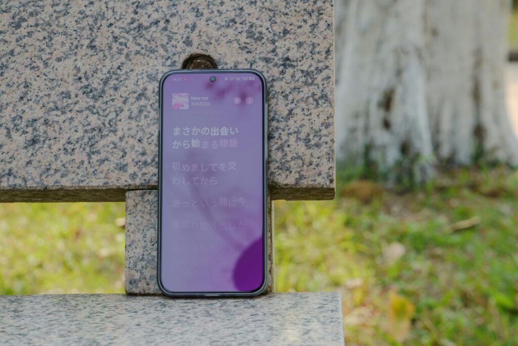 Global version phones explained: A Smartphone with Chinese ROM on a Granite Surface.